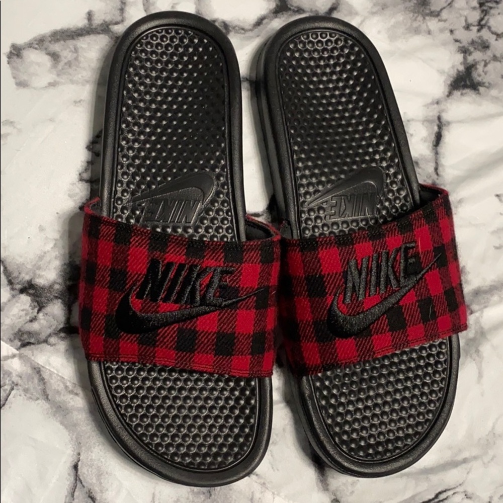 Black and red plaid Nike slides